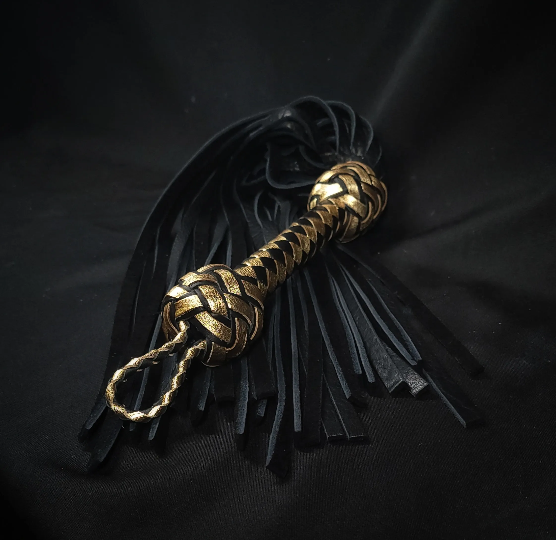 Black and Gold Bison Flogger Size Large- In Stock