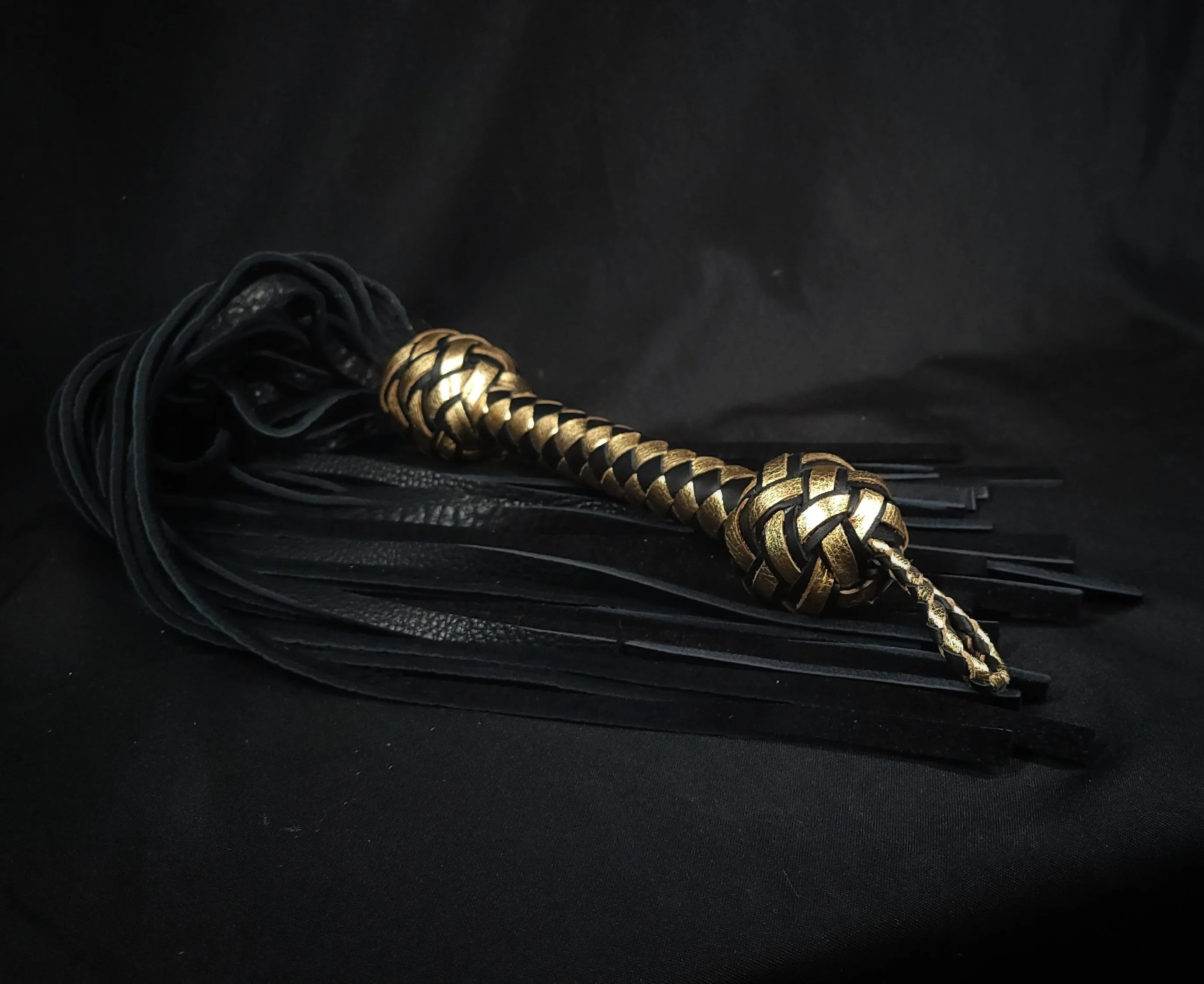 Black and Gold Bison Flogger Size Large- In Stock